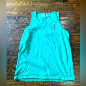 Dutch Bros Medium mint-green tank with happy faces. Never worn.